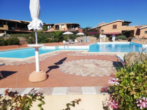 Отель Snug holiday home in Marinella with shared pool, Маринелла